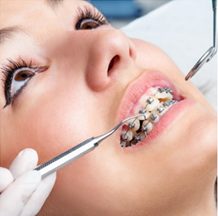 Woman getting Braces Tightened | Avalon Dental, your Carson and El Segundo Dentist